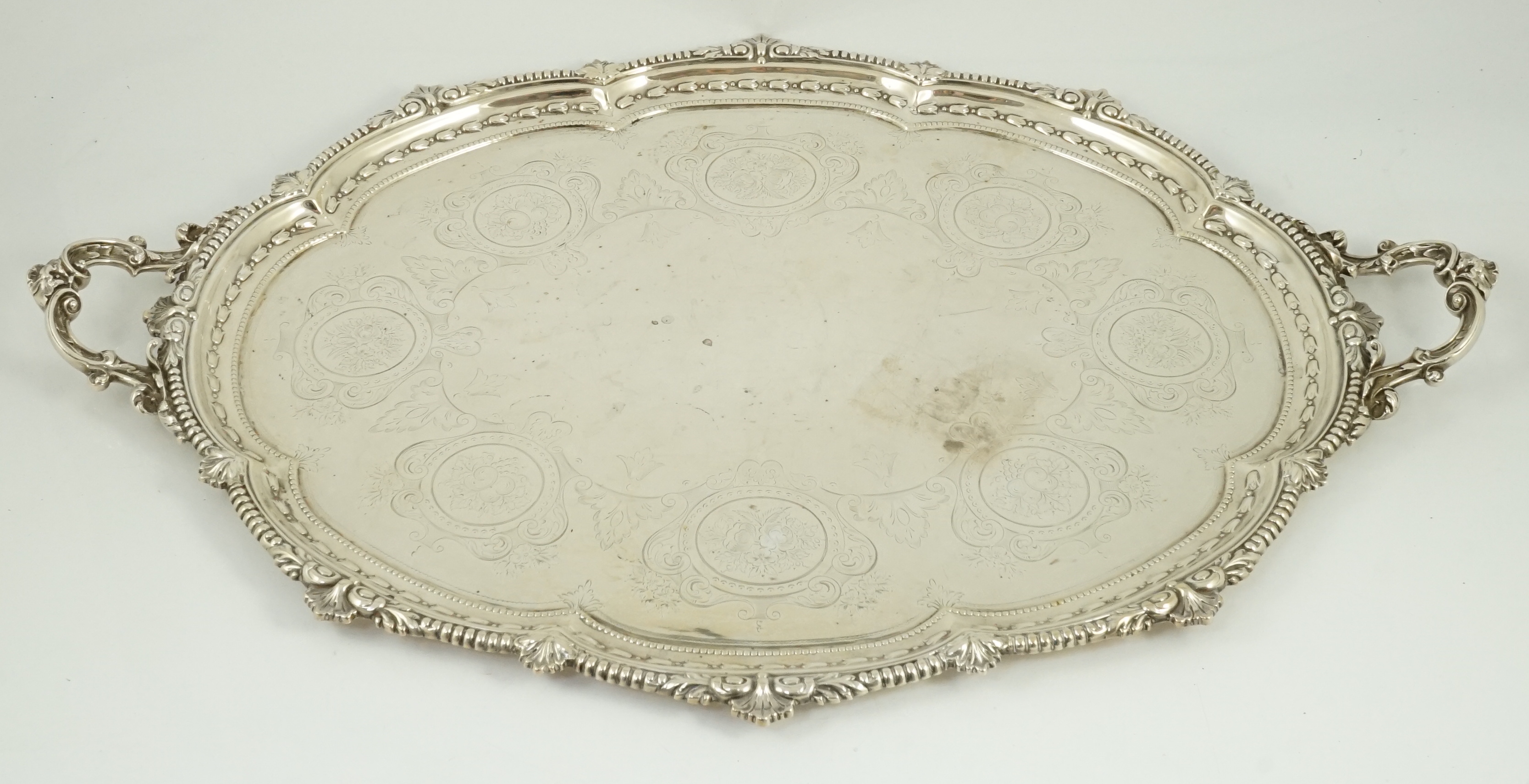 A large Victorian silver oval two handled tea tray, by Hawksworth, Eyre & Co